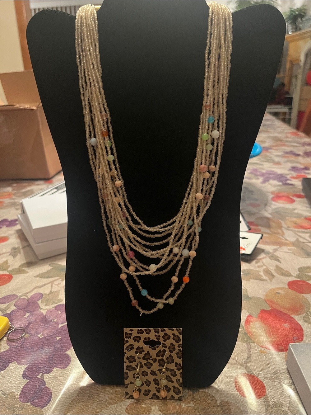 Multi-Strand Cream Beaded Necklace with Pastel Accents and Matching Earrings